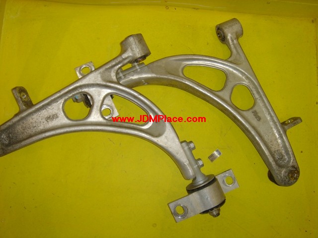 SU24003 - JDM STI Version 5 GC8 front aluminum control arms. Fits all 93-01 Imprezas, all 95-99 Legacys, 02-07 Impreza Wagons and 97-01 Foresters.