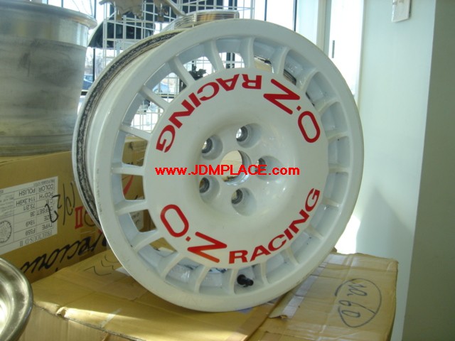 RI21003 - OZ Racing rally wheels white with red letters, 15x7 5x100 +35 offset.