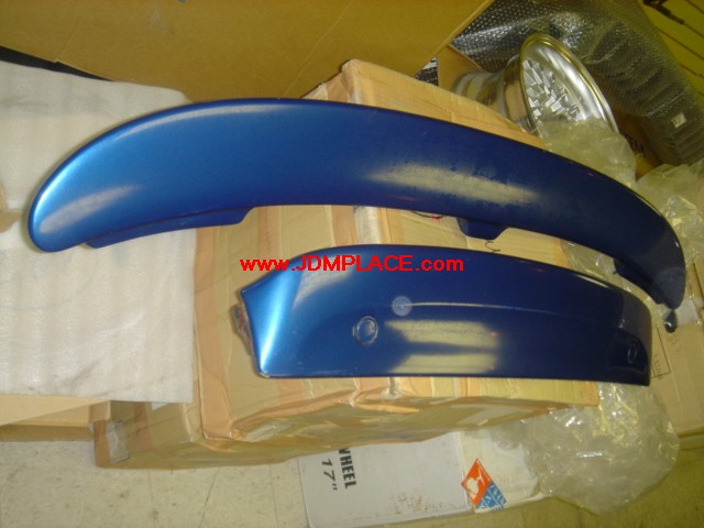 BD21007 - JDM GF WRX wagon top and bottom rear hatch spoilers in rally blue colour.