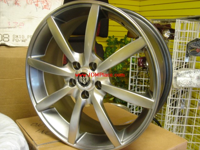 RI23009 - Rare BRAND NEW JDM Stern RS/Hinodex wheels 17x7 +48 offset 5x100 bolt pattern, in metallic gunmetal colour, clear Subaru 4/2 pot brakes.