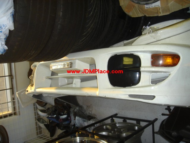 BD24001 - JDM STI Version 5/6 front bumper with fog covers, signals and rebar.