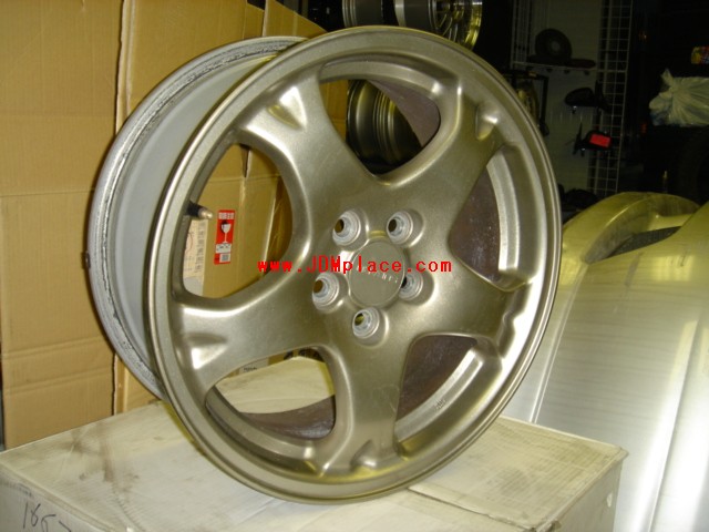 RI25002 - Rare JDM WRX NB 02 16x7 5x100 +53 offset, factory bronze colour, clear Suabru 4/2pot brakes.