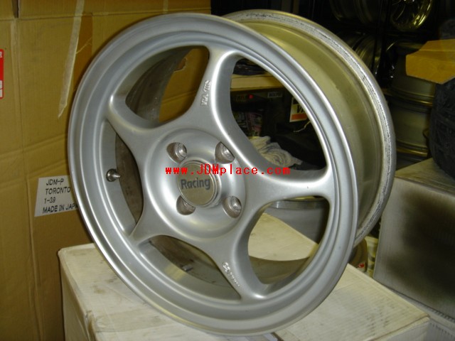 RI250012 - Enkei RP02 15x7 4x100 bolt pattern +40 offset rims in silver colour, light weight, fits most all Honda with 4x100 bolt pattern.
