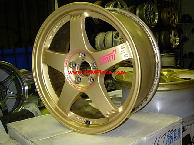 RI260015 - Very Rare JDM STI optional rims, made by RAYS Japan RS Zero 17x7.5 5x100 +48 offset in bright gold. Very lightweight, one piece forged!