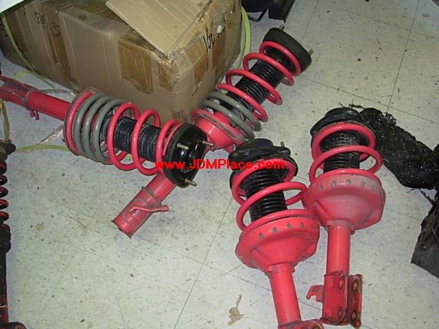 SU27008 - Rare JDM STI factory option Tarmac suspension tuned by Arai 4 way adjustable STI pink invert shocks with JDM STI pink springs and group N top mounts. Fits 02-07 Impreza RS, 02-07 WRX, 04 STI. Also fit older Impreza with minor mod.