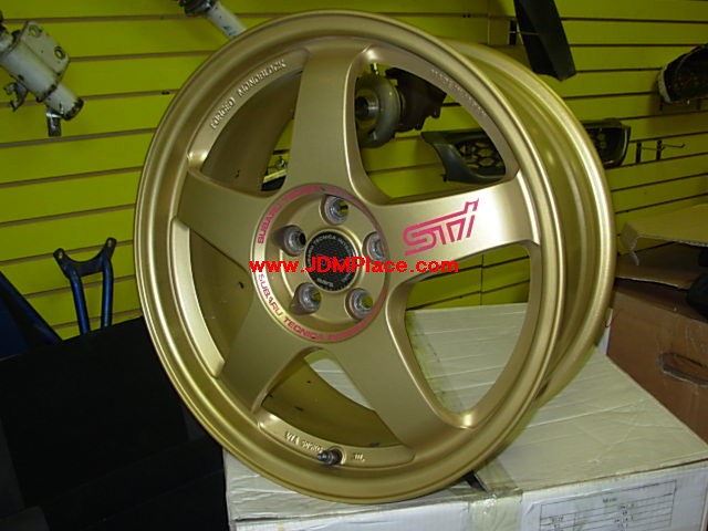 RI28002 - Very Rare JDM STI factory option upgrade wheels made by Rays, one piece forged gold colour 5 spokes 17x7.5 5x100 +48 offset, WILL CLEAR BREMBO BRAKES!
