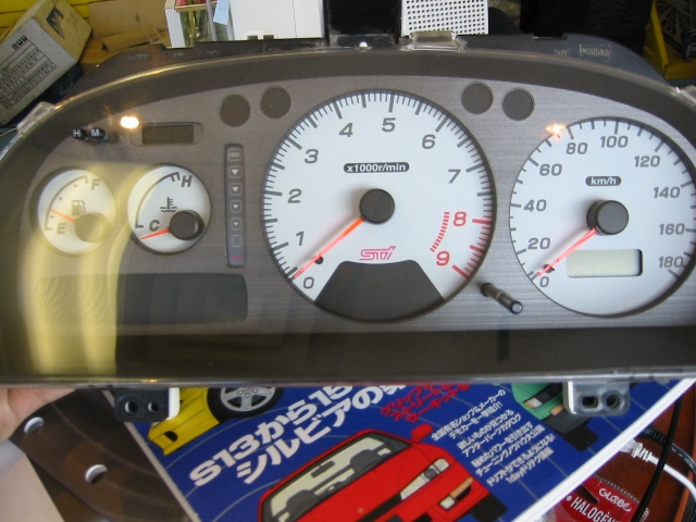 GU10003 - JDM GC8 Impreza Version 4 STI gauge cluster with DCCD with center tach white face, fits 98 Imprezas ONLY.