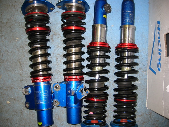 SU10002 - Cusco Comp2 height/damper adjustable coilovers for 89-93 240SX S13, front inverted mono tube design with 2.25 shock piston diameter.