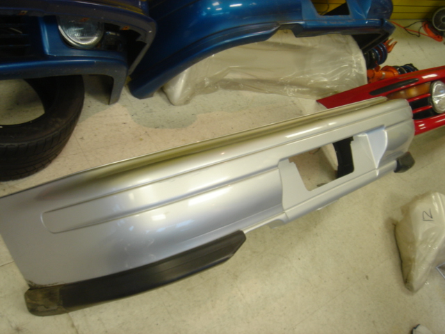 BD130005 - JDM Impreza Version 4 rear bumper with spats for 93-01 Impreza 4dr/2dr/wagon, in silver.