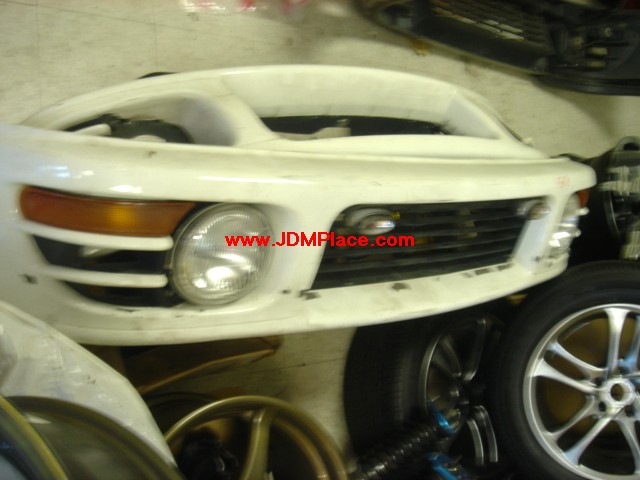 BD24004 - JDM STI Version 4 front bumper complete with re-bar, signals and fogs. Fits all 93-01 Imprezas.