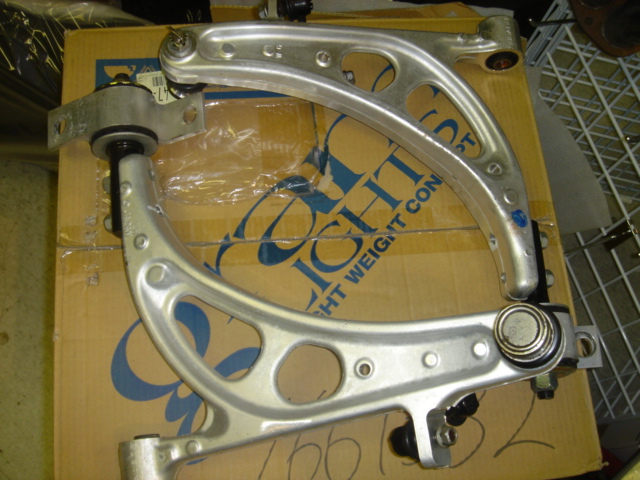 SU190007 - JDM STI Version 5 Impreza front forged aluminum control arms for 93-01 Impreza, 96-99 Legacy and 97-01 Forester, like new condition.